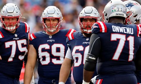 Patriots starting LG Cole Strange ruled out after being carted off with knee injury